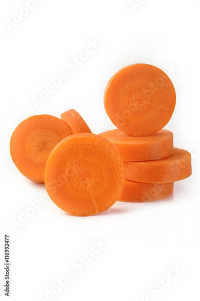 Fototapeta Fresh sliced carrots on white background