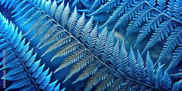 Fototapeta Intricate ice crystal patterns adorn a blue frost fern in this detailed glass portrait; winter botanical art.