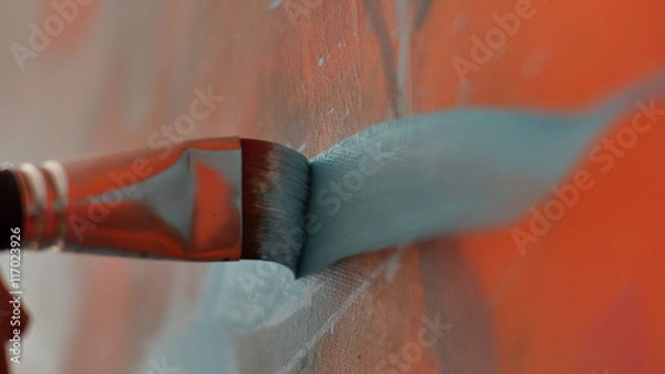Obraz An artist is showing some techniques of painting