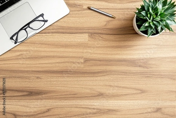 Fototapeta Top view of a wooden desk with a laptop, glasses, pen, and a green potted plant. Light wood background. Concept of workspace, design, and minimalism. Ai generative