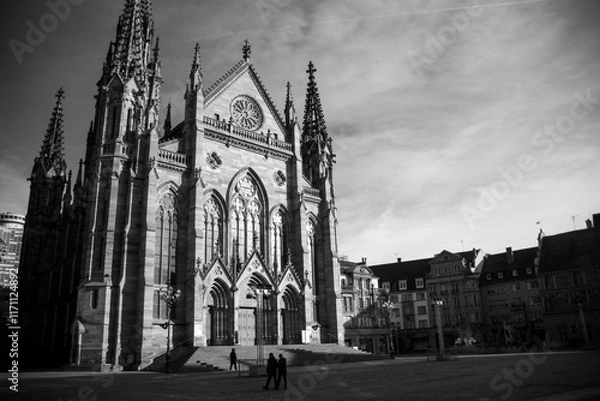 Obraz Mulhouse - France - 1 january 2025 - view of the st etienne protestant temple on empty place on black and white photography