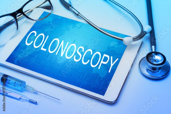 Fototapeta Colonoscopy word on tablet screen with medical equipment on background