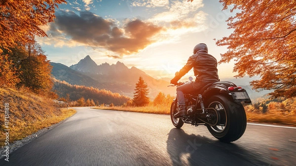 Fototapeta riding a motor during fall in the mountains during sunset with a profile angle 
