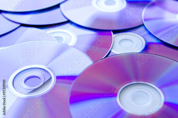 Obraz Many Compact Discs scattered seen up close