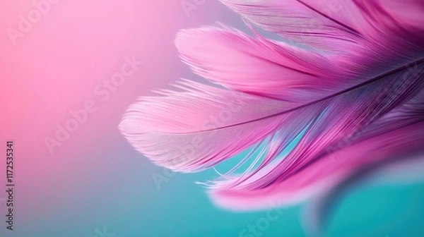 Fototapeta Feather abstract background idea. A close-up of a vibrant pink feather against a soft gradient background.