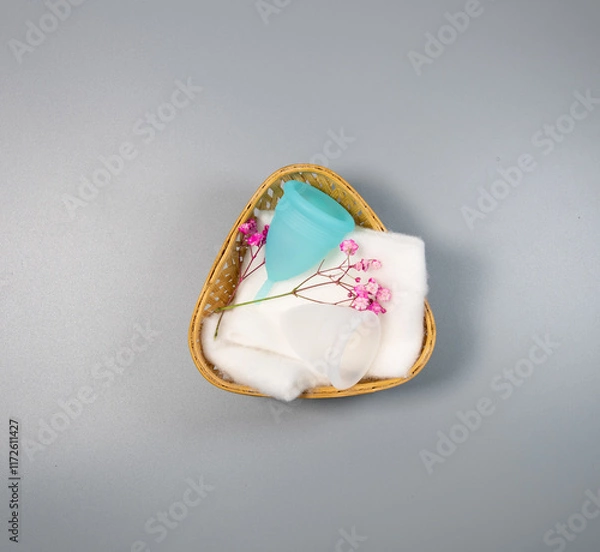 Fototapeta Menstrual cups in two colors, on a grey background, Eco-Friendly alternate to sanitary pads