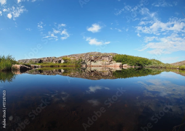 Fototapeta reflection in the lake. The coast of the Barents Sea