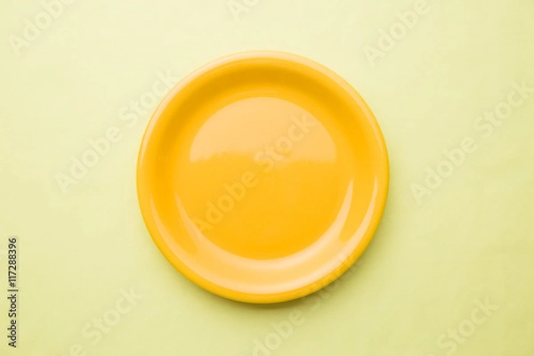 Obraz empty yellow plate