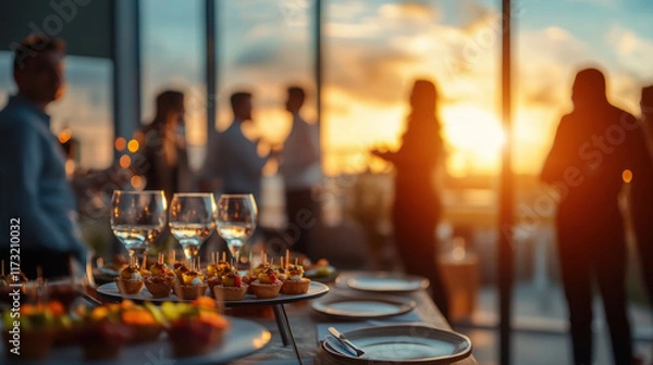 Obraz Elegant business event with appetizers and sunset view