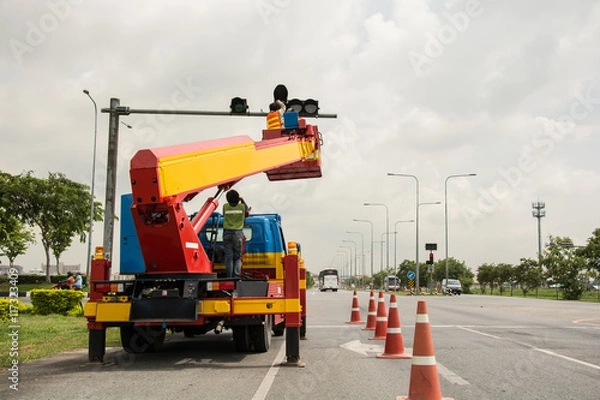 Obraz people is working on crane