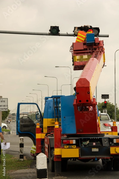 Obraz people is working on crane