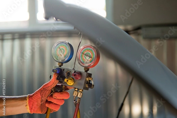 Obraz Auto mechanic worker in garage.
