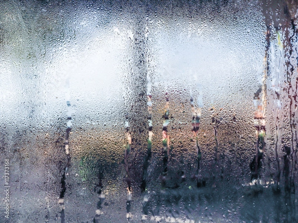 Obraz Water drops from home condensation on a window