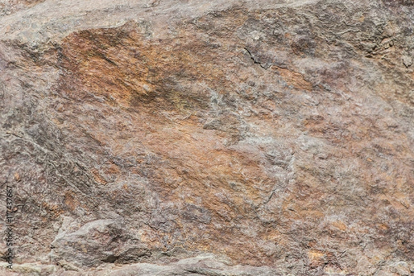 Obraz Stone background, rock wall backdrop with rough texture. Abstract, grungy and textured surface of stone material. Nature detail of rocks.