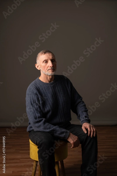 Obraz Authentic studio portrait of a handsome older man, selective focus