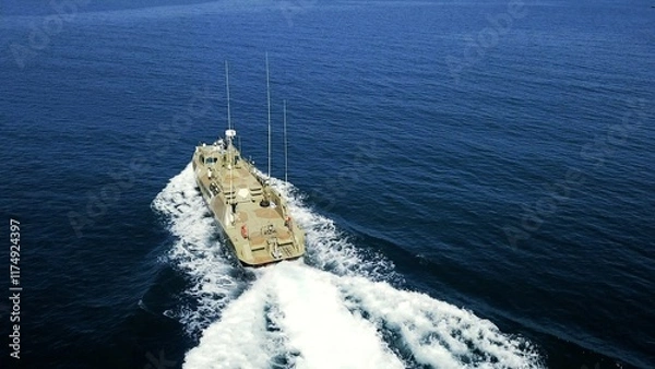 Fototapeta drone view - coast guard speed boat at full speed