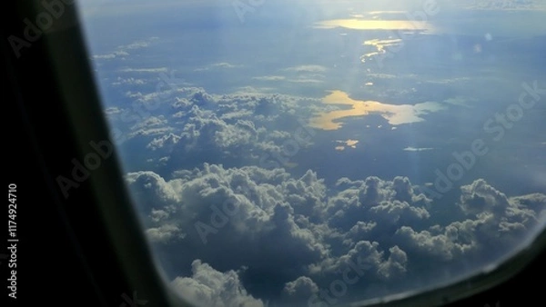 Fototapeta flying above the clouds