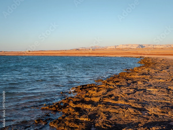 Fototapeta A Gulf of Aqaba shoreline inlet in Neom, Saudi Arabia, at the western end of the proposed futuristic linear city 'The Line'. Space for text.