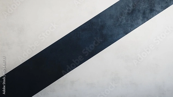 Fototapeta A single bold stripe in deep navy, running diagonally across a smooth white wall
