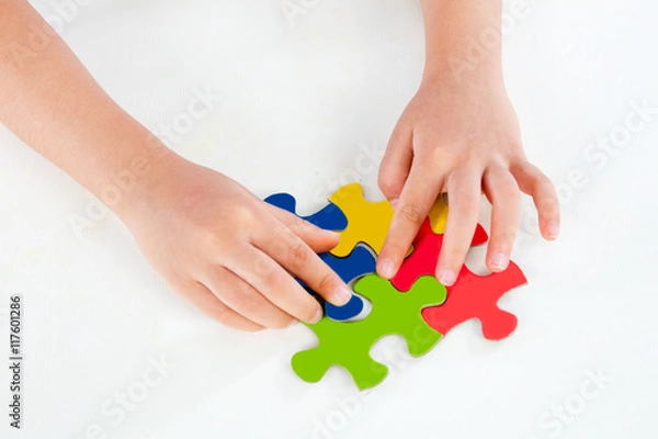 Fototapeta Child Playing Colorful Puzzle