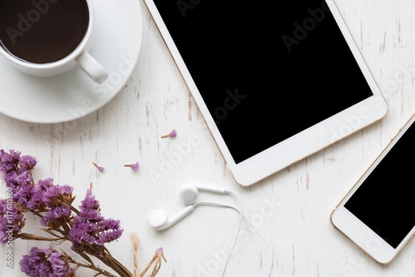Fototapeta Black coffee with smartphone and tablet on white rustic wooden background