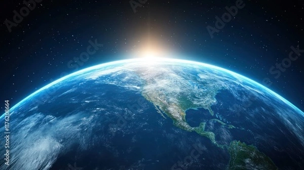 Fototapeta Earth viewed from space with a sunrise on the horizon.