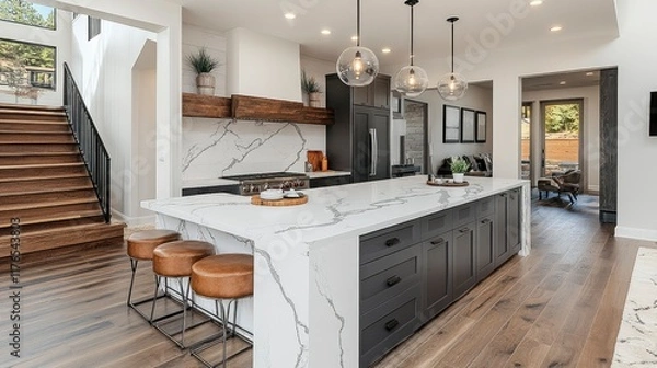 Fototapeta Modern Luxury Kitchen Island with Marble Countertop and Dark Gray Cabinets