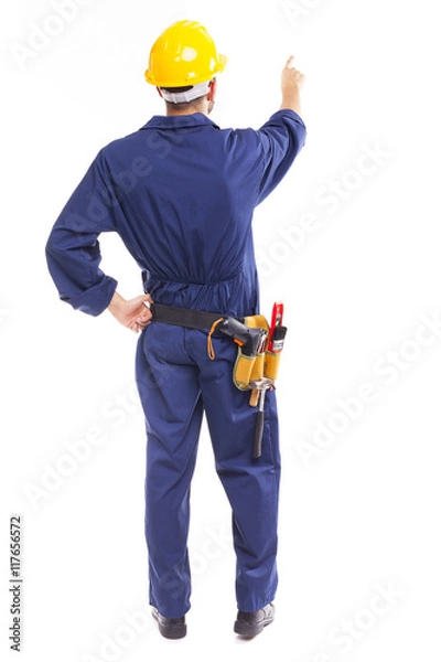 Obraz Image of a young worker pointing, isolated on white background