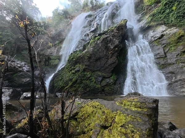 Fototapeta Khlonglan waterfall with moss in rainforest.