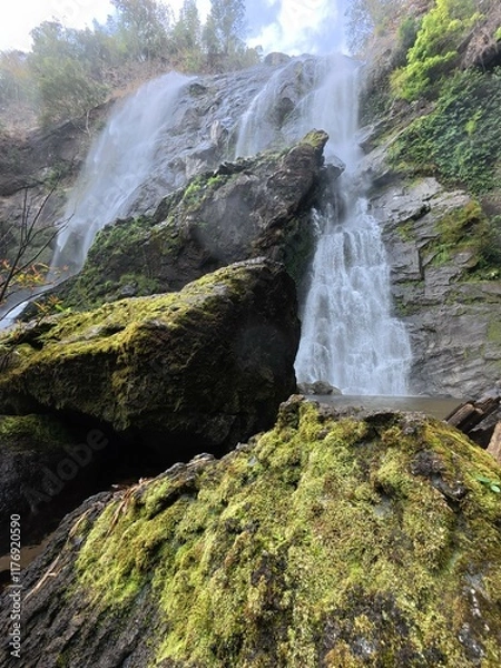 Fototapeta Khlonglan waterfall with moss in rainforest.