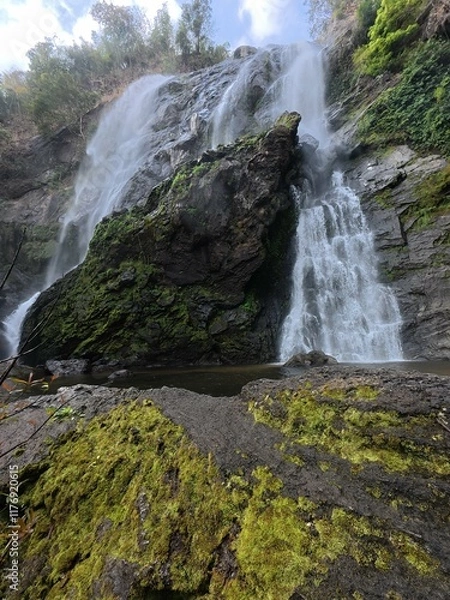 Fototapeta Khlonglan waterfall with moss in rainforest.
