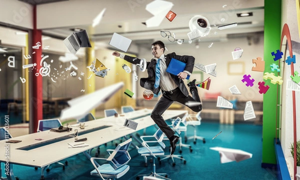 Fototapeta Jumping businessman in office . Mixed media