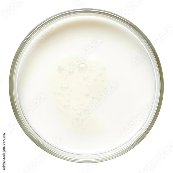 Fototapeta Top view of a glass bowl filled with milk isolated on a white background.