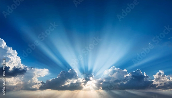 Obraz the solar shining through the clouds in a blue sky with beams of mild coming from the middle of the clouds