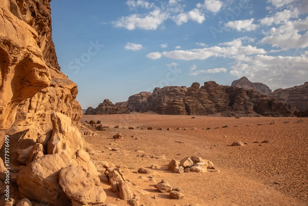 Fototapeta Sunny Scenery of Beautiful Desert in Jordan. Wadi Rum in Middle East with Rocky Mountains and Sandy Surface during Daytime.
