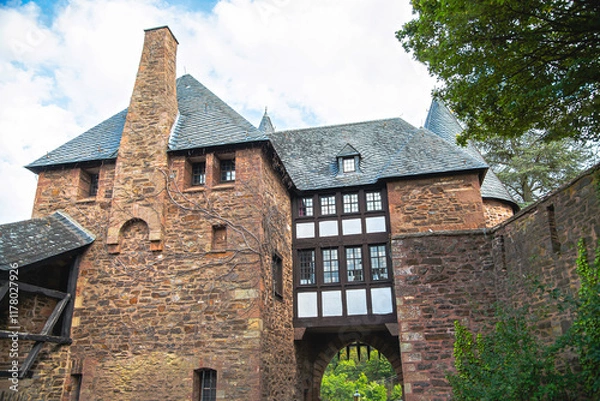 Obraz The Historic Architecture of a Magnificent Medieval Castle Entrance Captivates Visitors