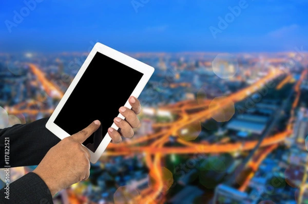 Obraz Businessman using tablet pc.