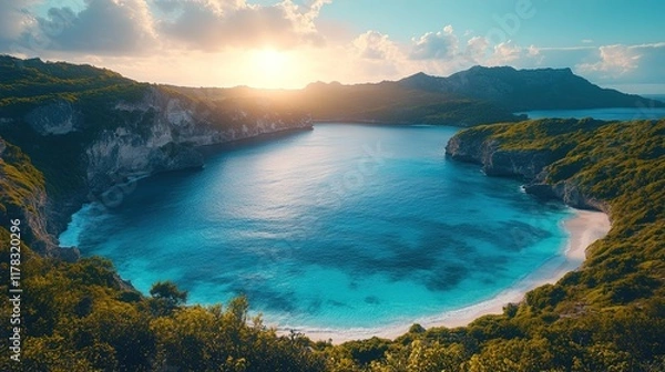 Fototapeta Serene coastal landscape at sunset with clear blue waters and lush greenery.