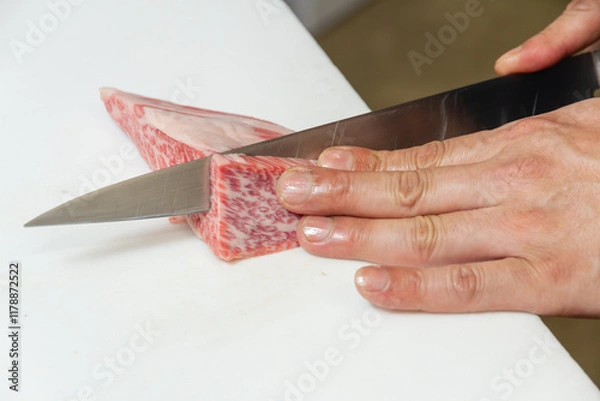 Fototapeta 焼肉をカットする