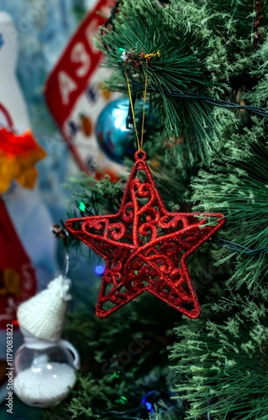 Obraz Christmas toys on an artificial Christmas tree close-up