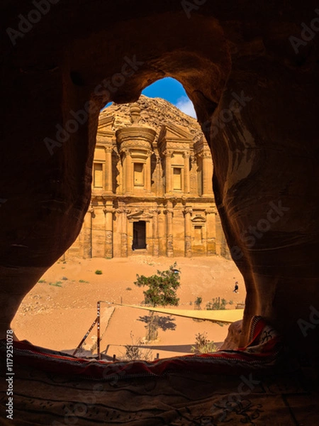 Fototapeta Petra, Jordan : ancient Monastery building in Petra (Ad Deir) from a cave // one of the Seven Wonders of the World (historical place in Arab countries)