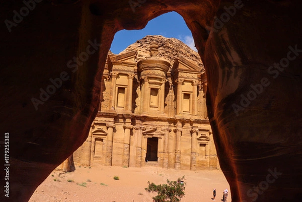 Fototapeta Petra, Jordan : ancient Monastery building in Petra (Ad Deir) from a cave // one of the Seven Wonders of the World (historical place in Arab countries)