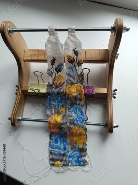 Obraz Beautiful floral beaded gerdan and weaving device