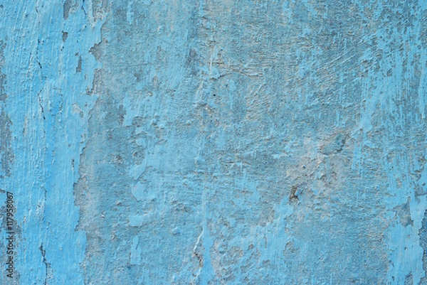 Fototapeta Wall fragment with attritions and cracks