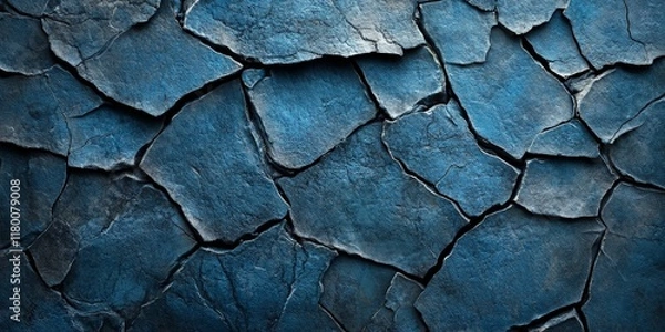 Fototapeta Close-up texture of dark blue slate rocks, showcasing rough cracked layers. Ideal for backgrounds, geology presentations, or design projects requiring a natural, earthy tone.