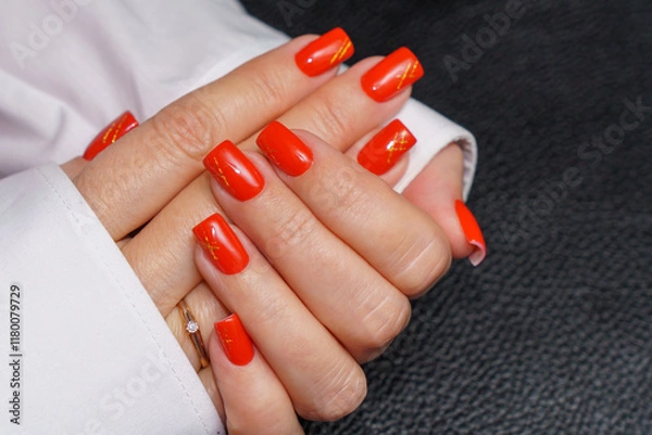 Obraz women's hands with red manicure