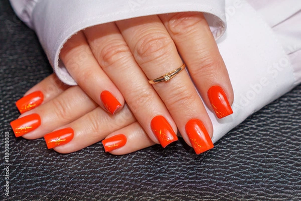 Obraz women's hands with red manicure