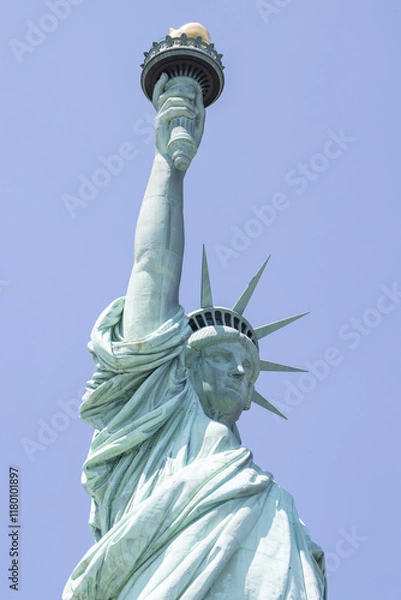 Obraz Closeup of the Statue of Liberty on the Liberty Island in New York against a clear blue sky.