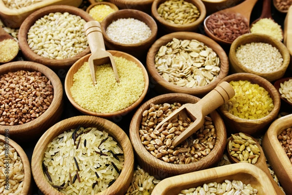 Fototapeta Colorful mix of grain varieties: oat and wheat, rice and millet, buckwheat and barley, quinoa and polenta. Food ingridients for healthy diet background, selective focus
