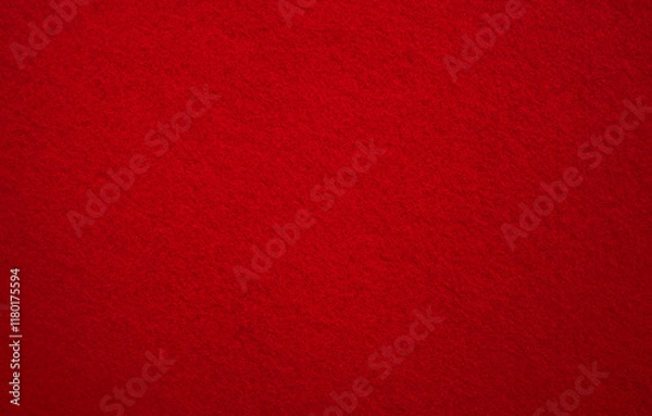 Fototapeta A photo of the texture of the red-colored fabric.Red felt fabric background.